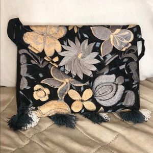 Embroidered hand bag/side bag.